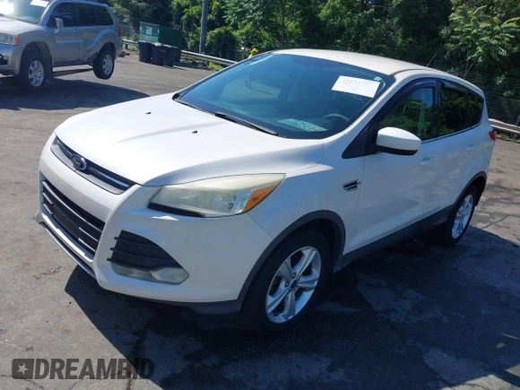 2013 Ford Escape SE with VIN 1FMCU0GX2DUB85361, listed as a IAAI auction lot 42552881 with 211,032 mi miles and . Bid and sale history available at DreamBid. Image 18.