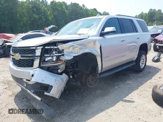 2019 Chevrolet Tahoe LT with VIN 1GNSKBKC8KR363433, listed as a IAAI auction lot 42567045 with 122,956 mi miles and . Bid and sale history available at DreamBid. Image 19.