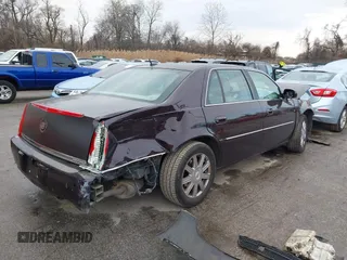 2008 Cadillac DTS 1SC with VIN 1G6KD57Y68U118535, listed as a IAAI auction lot 41156426 with 145,568 mi miles and . Bid and sale history available at carsss.com. Image 4.