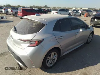2022 Toyota Corolla SE with VIN JTND4MBE4N3150989, listed as a IAAI auction lot 40565981 with 51,377 mi miles and . Bid and sale history available at DreamBid. Image 4.