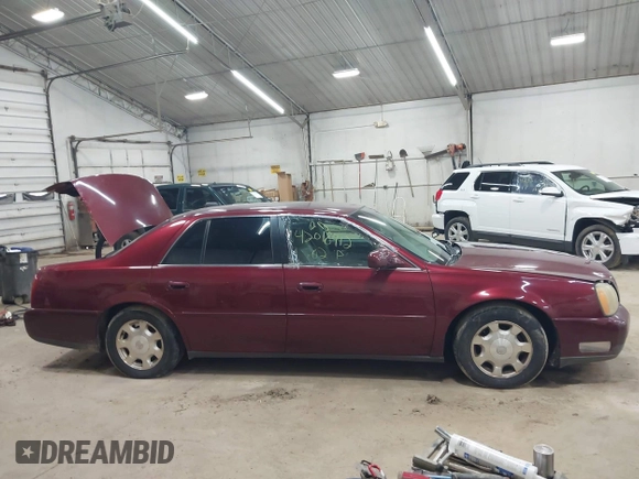 2002 Cadillac DeVille with VIN 1G6KD54Y12U214732, listed as a IAAI auction lot 42018412 with 139,474 mi miles. Bid and sale history available at carsss.com. Image 13.