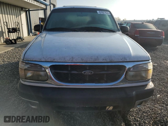 1999 Ford Explorer XL z VIN 1FMZU34XXXUB80803, wystawiony jako Copart lot #87027834 z przebiegiem 222 864 mil mil oraz Szkoda całkowita • Salvage title. Historia ofert i sprzedaży dostępna na DreamBid. Obrazek 5.