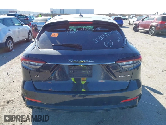 2022 Maserati Levante Modena S z VIN ZN661ZUM0NX400467, wystawiony jako IAAI lot #41294140 z przebiegiem 93 148 mil mil oraz . Historia ofert i sprzedaży dostępna na DreamBid. Obrazek 17.