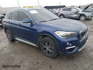 2019 BMW X1 sDrive28i with VIN WBXHU7C5XK5L10933, listed as a IAAI auction lot 41931162 with 55,308 mi miles. Bid and sale history available at carsss.com. Image 1.