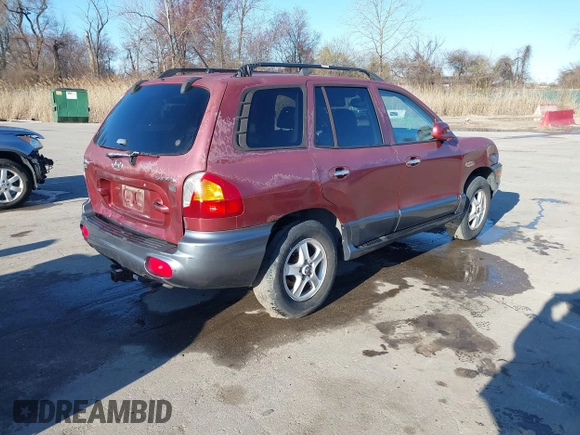 2004 Hyundai Santa Fe GLS with VIN KM8SC13EX4U798868, listed as a IAAI auction lot 41835652 with 222,350 mi miles. Bid and sale history available at carsss.com. Image 4.