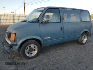 1986 GMC Safari z VIN 1GDDM15Z1GB521872, wystawiony jako Copart lot #87655995 z przebiegiem 30 889 mil mil oraz Szkody całkowita. Historia ofert i sprzedaży dostępna na DreamBid. Obrazek 1.