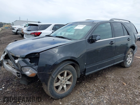 2008 Cadillac SRX RWD z VIN 1GYEE637180139577, wystawiony jako IAAI lot #42161039 z przebiegiem 159 816 mil mil oraz . Historia ofert i sprzedaży dostępna na DreamBid. Obrazek 2.