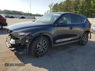 2018 Mazda CX-5 Touring z VIN JM3KFACM3J0349917, wystawiony jako Copart lot #53135415 z przebiegiem 87 286 mil mil oraz Szkoda całkowita • Salvage title. Historia ofert i sprzedaży dostępna na DreamBid. Obrazek 1.