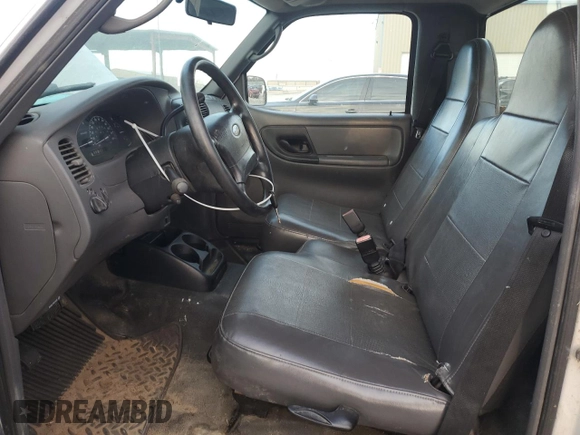 2003 Ford Ranger XL Fleet with VIN 1FTYR10E43PA46677, listed as a Copart auction lot 84056844 with 217,514 mi miles and Clean Title. Bid and sale history available at carsss.com. Image 7.