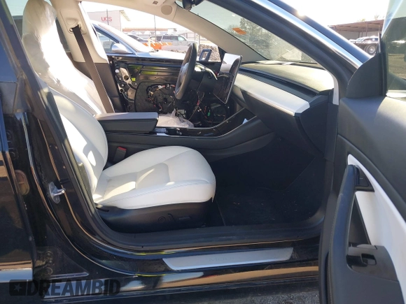 2020 Tesla Model 3 Standard Range Plus with VIN 5YJ3E1EA7LF802492, listed as a IAAI auction lot 40846048 with 36,488 mi miles and . Bid and sale history available at DreamBid. Image 5.