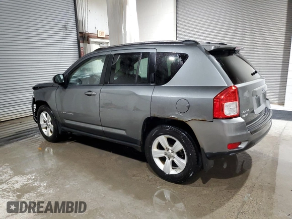 2012 Jeep Compass Latitude with VIN 1C4NJDEB1CD559901, listed as a Copart auction lot 46044185 with 86,000 mi miles and Salvage Title. Bid and sale history available at DreamBid. Image 2.