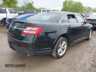 2015 Ford Taurus SEL z VIN 1FAHP2E86FG172631, wystawiony jako IAAI lot #42307630 z przebiegiem 95 184 mil mil oraz . Historia ofert i sprzedaży dostępna na DreamBid. Obrazek 4.