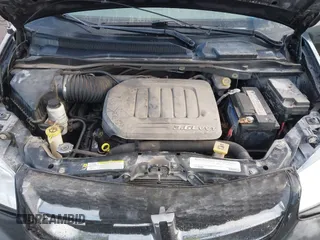 2012 Dodge Grand Caravan SXT with VIN 2C4RDGCG3CR318900, listed as a IAAI auction lot 41145958 with 201,117 mi miles and . Bid and sale history available at DreamBid. Image 10.