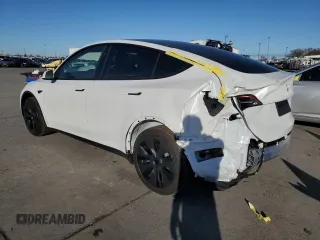 2025 Tesla Model Y Long Range with VIN 7SAYGDEDXSF228371, listed as a Copart auction lot 43925575 with 2,848 mi miles and Salvage Title. Bid and sale history available at DreamBid. Image 2.