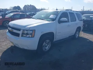 2014 Chevrolet Tahoe LT with VIN 1GNSCBE06ER233105, listed as a IAAI auction lot 41753190 with 161,056 mi miles and . Bid and sale history available at DreamBid. Image 19.