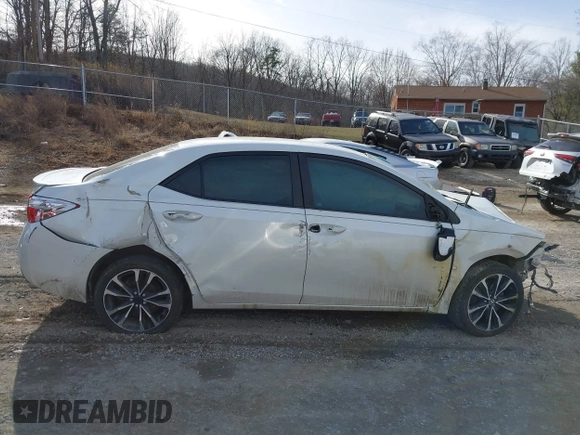 2017 Toyota Corolla L z VIN 5YFBURHE5HP633791, wystawiony jako IAAI lot #41426630 z przebiegiem 99 450 mil mil oraz . Historia ofert i sprzedaży dostępna na DreamBid. Obrazek 14.