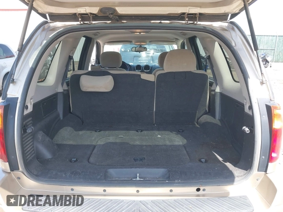 2005 GMC Envoy SLE with VIN 1GKDT13S252264932, listed as a IAAI auction lot 41981566 with 140,566 mi miles. Bid and sale history available at carsss.com. Image 17.