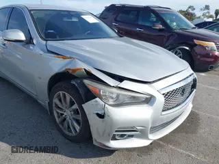 2014 Infiniti Q50 Sport with VIN JN1BV7AP9EM674097, listed as a IAAI auction lot 41741697 with 105,797 mi miles and . Bid and sale history available at DreamBid. Image 6.