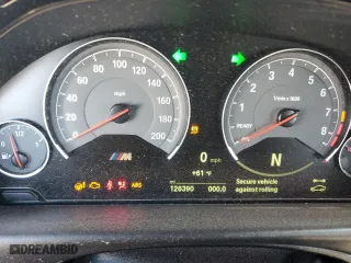 2015 BMW M4 with VIN WBS3R9C55FK333945, listed as a Copart auction lot 48896975 with 126,390 mi miles and Salvage Title. Bid and sale history available at carsss.com. Image 9.