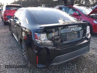 2015 Scion tC z VIN JTKJF5C74FJ010874, wystawiony jako IAAI lot #41496551 z przebiegiem 132 586 mil mil oraz . Historia ofert i sprzedaży dostępna na DreamBid. Obrazek 3.