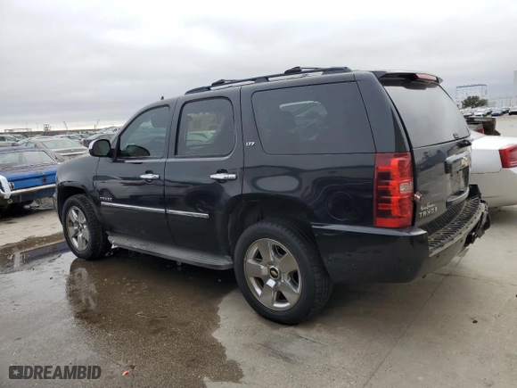 2010 Chevrolet Tahoe LTZ with VIN 1GNUCCE03AR280584, listed as a Copart auction lot 89387585 with 216,725 mi miles and Salvage Title. Bid and sale history available at carsss.com. Image 2.