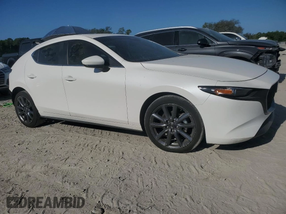 2024 Mazda 3 S Preferred with VIN JM1BPALM9R1709400, listed as a Copart auction lot 52795505 with 10,790 mi miles and Salvage title. Bid and sale history available at DreamBid. Image 4.