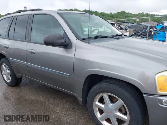 2008 GMC Envoy SLE2 with VIN 1GKDT13S482244279, listed as a IAAI auction lot 42144735 with 221,682 mi miles. Bid and sale history available at carsss.com. Image 13.
