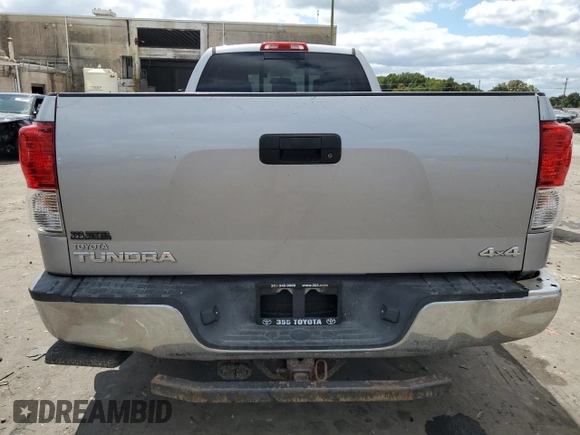 2012 Toyota Tundra 4WD Truck with VIN 5TFCY5F15CX013941, listed as a Copart auction lot 69946754 with 163,228 mi miles and Salvage Title. Bid and sale history available at carsss.com. Image 6.