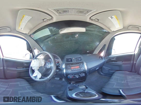 2012 Suzuki SX4 LE z VIN JS2YC5A34C6300969, wystawiony jako Copart lot #49036095 z przebiegiem 163 367 mil mil oraz Szkoda całkowita • Salvage title. Historia ofert i sprzedaży dostępna na DreamBid. Obrazek 14.