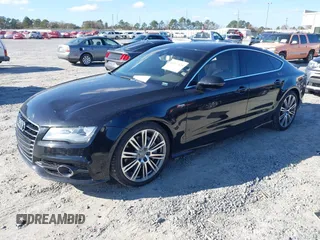2013 Audi A7 3.0 Prestige with VIN WAU2GAFC2DN065112, listed as a IAAI auction lot 41117426 with 159,105 mi miles. Bid and sale history available at carsss.com. Image 18.