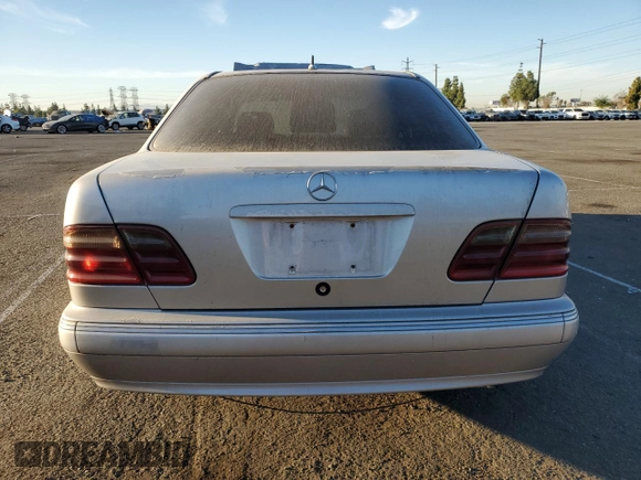 2002 Mercedes-Benz E-Class with VIN WDBJF65J32B496411, listed as a Copart auction lot 75690884 with 128,855 mi miles and Salvage Title. Bid and sale history available at carsss.com. Image 6.