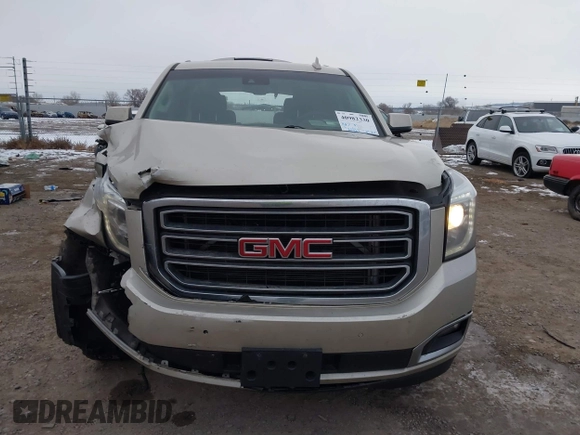 2015 GMC Yukon SLT z VIN 1GKS2BKC6FR655777, wystawiony jako IAAI lot #40982330 z przebiegiem 120 627 mil mil oraz . Historia ofert i sprzedaży dostępna na DreamBid. Obrazek 6.