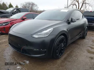 2022 Tesla Model Y Performance z VIN 7SAYGDEF4NF350696, wystawiony jako IAAI lot #41662924 z przebiegiem 36 747 mil mil oraz . Historia ofert i sprzedaży dostępna na DreamBid. Obrazek 2.