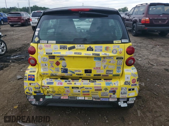 2013 Smart fortwo Pure z VIN WMEEJ3BA2DK663432, wystawiony jako Copart lot #63203755 z przebiegiem 79 786 mil mil oraz Czysty tytuł • Clean title. Historia ofert i sprzedaży dostępna na DreamBid. Obrazek 6.