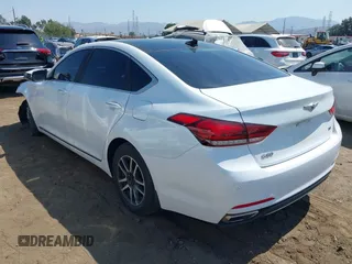 2018 Genesis G80 3.8L z VIN KMHGN4JE1JU225986, wystawiony jako IAAI lot #39921592 z przebiegiem 30 509 mil mil oraz . Historia ofert i sprzedaży dostępna na DreamBid. Obrazek 3.