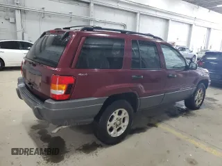 2001 Jeep Grand Cherokee Laredo with VIN 1J4GW48S11C618478, listed as a Copart auction lot 57889965 with Not provided miles and Clean title. Bid and sale history available at DreamBid. Image 3.