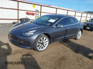 2020 Tesla Model 3 Long Range with VIN 5YJ3E1EB3LF801834, listed as a IAAI auction lot 42015079 with 47,793 mi miles. Bid and sale history available at carsss.com. Image 20.