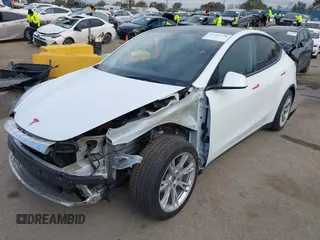 2021 Tesla Model Y Long Range with VIN 5YJYGDEE0MF209045, listed as a IAAI auction lot 41762738 with 24,721 mi miles. Bid and sale history available at carsss.com. Image 22.