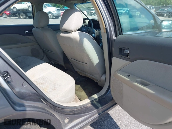 2012 Ford Fusion SE with VIN 3FAHP0HA0CR102548, listed as a IAAI auction lot 42628344 with 166,597 mi miles and . Bid and sale history available at DreamBid. Image 8.