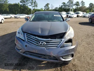 2013 Hyundai Azera с VIN KMHFH4JG4DA323839, выставлен на аукционе Copart как лот 58860835 с пробегом 180 982 миль миль и Списание • Salvage title. История ставок и продаж доступна на DreamBid. Изображение 5.