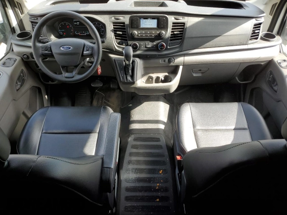 2023 Ford Transit Cargo с VIN 1FTBR2CG6PKA87002, выставлен на аукционе Copart как лот 75418304 с пробегом 24 240 миль миль и Списание • Salvage title. История ставок и продаж доступна на DreamBid. Изображение 8.