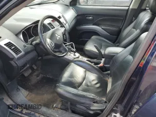 2010 Mitsubishi Outlander z VIN JA4AT2AWXAZ606259, wystawiony jako Copart lot #65532304 z przebiegiem 256 081 mil mil oraz Szkoda całkowita • Salvage title. Historia ofert i sprzedaży dostępna na DreamBid. Obrazek 7.