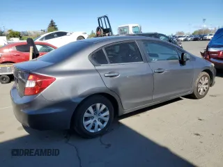 2012 Honda Civic LX z VIN 2HGFB2F53CH324712, wystawiony jako Copart lot #46248345 z przebiegiem 316 459 mil mil oraz Szkoda całkowita • Salvage title. Historia ofert i sprzedaży dostępna na DreamBid. Obrazek 3.
