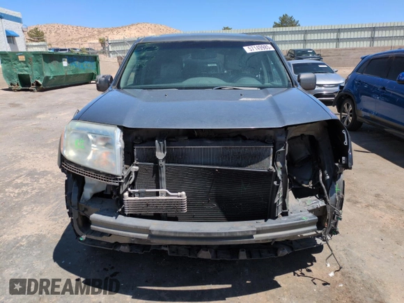 2012 Honda Pilot EX-L z VIN 5FNYF4H51CB061095, wystawiony jako Copart lot #57149985 z przebiegiem 170 486 mil mil oraz Szkoda całkowita • Salvage title. Historia ofert i sprzedaży dostępna na DreamBid. Obrazek 5.