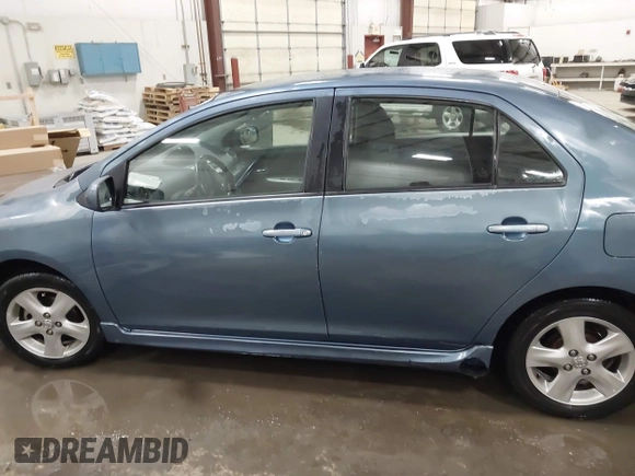2007 Toyota Yaris with VIN JTDBT903371175510, listed as a IAAI auction lot 41573587 with 218,210 mi miles. Bid and sale history available at carsss.com. Image 14.