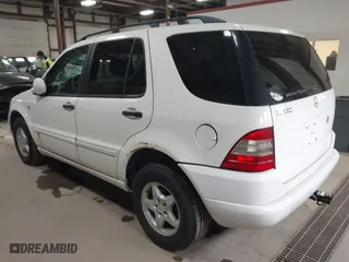 2000 Mercedes-Benz M-Class with VIN 4JGAB54E2YA166846, listed as a IAAI auction lot 41744657 with 226,711 mi miles. Bid and sale history available at carsss.com. Image 3.