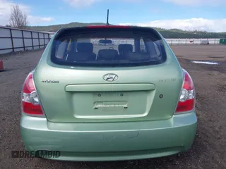 2008 Hyundai Accent GS with VIN KMHCM36C28U064545, listed as a IAAI auction lot 41958102 with 120,679 mi miles. Bid and sale history available at carsss.com. Image 16.