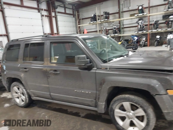 2016 Jeep Patriot High Altitude Edition with VIN 1C4NJRFB0GD632774, listed as a IAAI auction lot 41149683 with 96,495 mi miles. Bid and sale history available at carsss.com. Image 13.