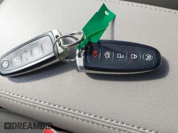 2018 Ford Escape Titanium with VIN 1FMCU9J92JUB01162, listed as a IAAI auction lot 42495112 with 96,280 mi miles and . Bid and sale history available at DreamBid. Image 11.