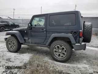 2013 Jeep Wrangler Rubicon 10th Anniversary with VIN 1C4BJWCG6DL507667, listed as a Copart auction lot 84139134 with 264,970 mi miles and Salvage Title. Bid and sale history available at DreamBid. Image 2.